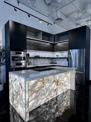 Custom kitchen design by Modern Concepts.  Yes - the island has lights in it!
