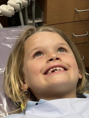 Ms. B watching TV waiting for her extraction.