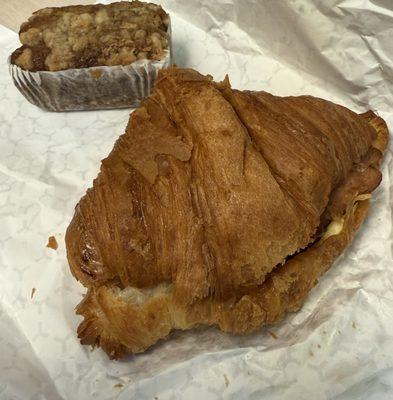 Bacon, egg and cheese on a croissant. With banana bread on the side.