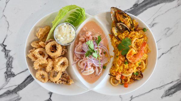 La Ronda Plate; is a combination of our three most popular dishes, Fried Calamari, Ceviche Traditional seafood rice.