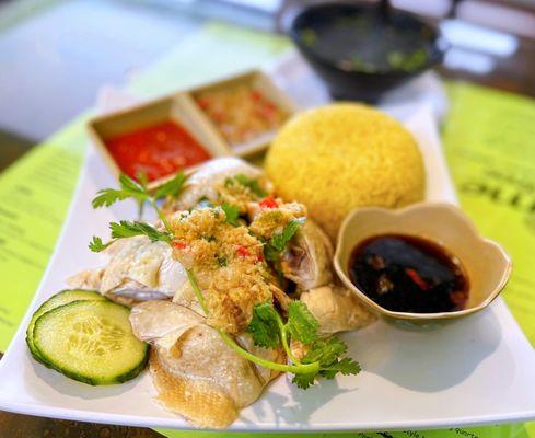 Hainan Chicken Rice: Steamed Chicken w/ rice cooked in broth, ginger+soy+chili sauce, side broth | $15.99 (requested mix of dark+white meat)