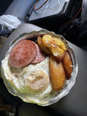 2 over easy eggs, plantains, salami, rice & beans