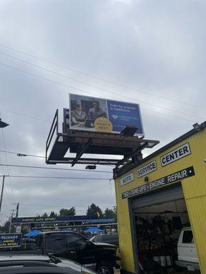 It's right behind the car wash you will see a billboard