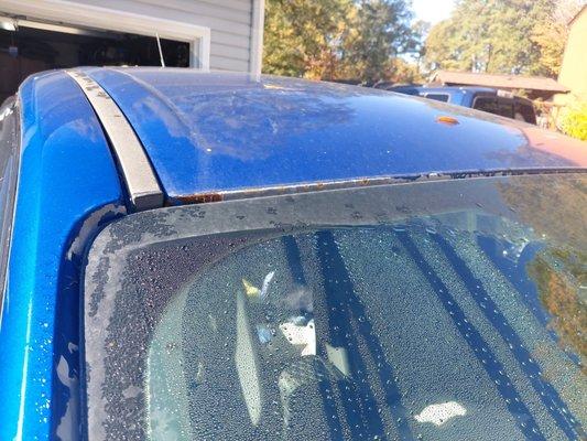 Peeling paint and rust before repair