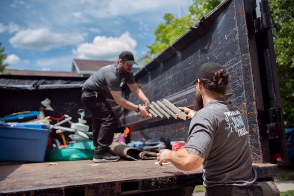 Two Men and a Junk Truck