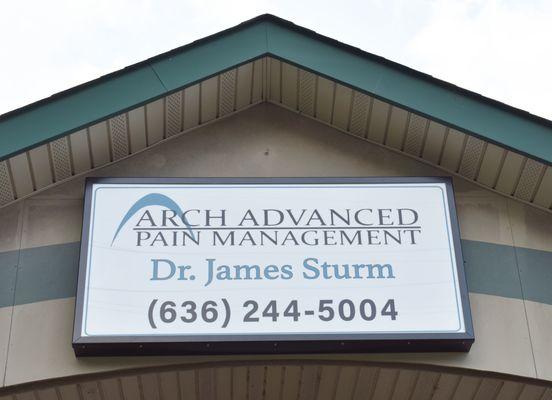 The sign in front of our building