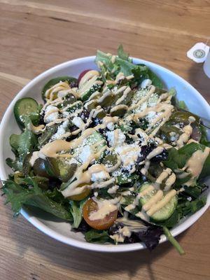 Make your own salad bowl with sriracha dressing! Delicious just needed a little more of it for price.