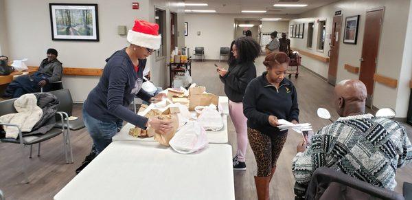 Local Church passing out Lunches and Toiletries once a month in the Jeltz dayroom