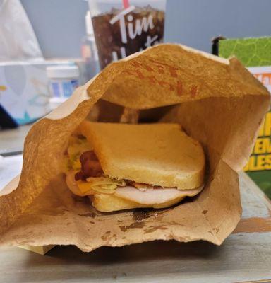 My sandwich as I opened bag. No paper around it, not cut.