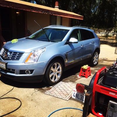 Nice quick detail to this Beautiful blue Cadillac SUV