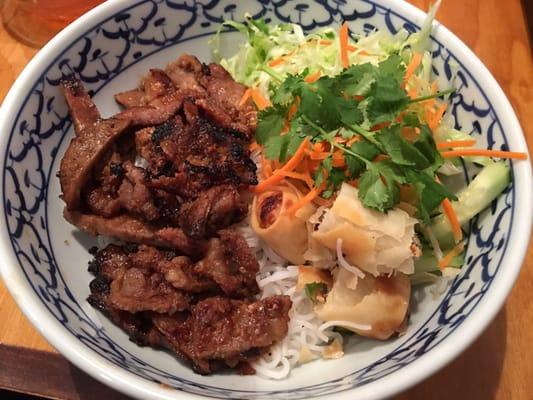 Bun Cha Gio- vermicelli noodles w/ fried eggrolls bedded W/ lettuce, cucumbers, and cilantro served w/ fish sauce