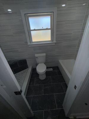 And I tile the wall to join it into a full master bathroom