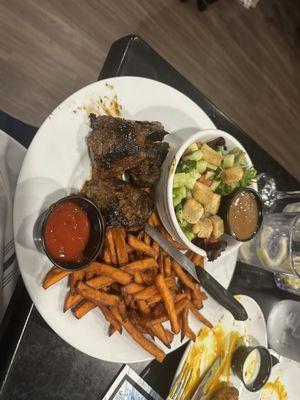 Steak tips and salad and sweet potato fries
