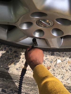 The air pump is automated. You use a credit card, set the pump to the tire pressure and when the tire is full the pump beeps.