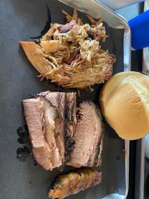Pulled pork and smoked brisket along with smoked jalapeño popper