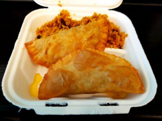Giant Empanadas! Honey & Manda combo over Arroz con Gandules...