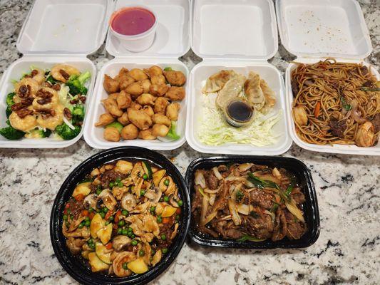 Walnut Prawns , Sweet/Sour Pork, Potstickers, Lo Mein Noodles, Egg Foo Young & Mongolian Chicken.