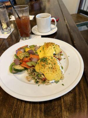 Brunch seafood Benedict with vegetables. Plus a delicious Bloody Mary.