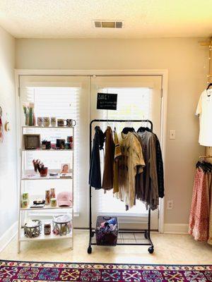 Back room has mostly clothes.