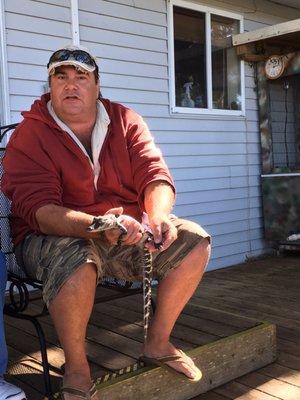 Captain Joe explaining some things about gators. We could hold them if we chose to.