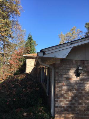 peeling paint and rot from clogged gutters