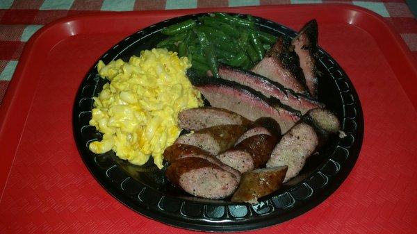 Brisket, sausage, mac n cheese and green beans. Best brisket around!