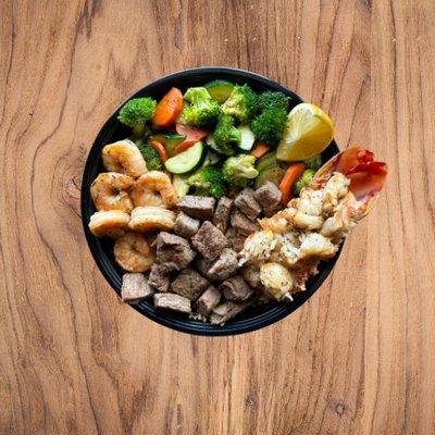 Trio, Choice of 3 Proteins
(Shrimp, Lobster, and Top Sirloin Steak Pictured )