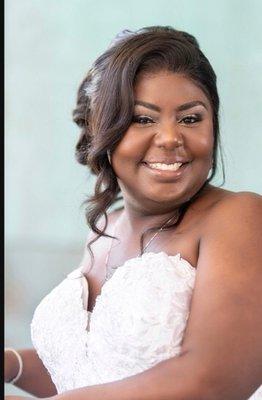 Formal updo on custom frontal lace wig unit.