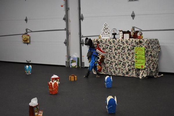 Found it! Where is my cookie? Christmas search in a K9 Nose Work® class.