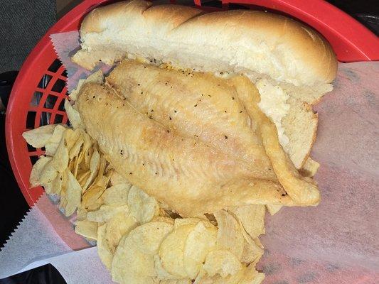 Fish sandwich with chips