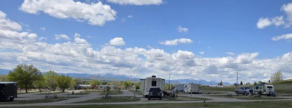 RV sites on hill, with view of Rocky Mountains