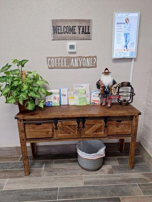 Side table with Texas Santa decoration.