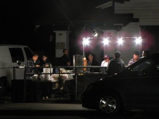 The kid in the hat is Smiling Boy. The dude in stripes is the grouch who said I couldn't take photos.