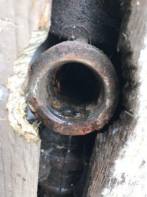 Rusty opening that was sealed closed with a plastic cap- Thanks Miguel!