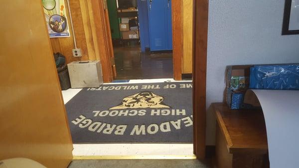 Sitting in the VP's office.