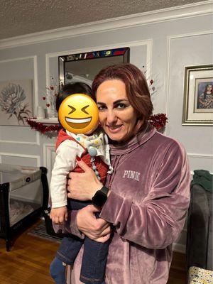 Ms. Marine with our kiddo. His facial expression is pretty much this emoji. lol He loves 'going to school' with her.