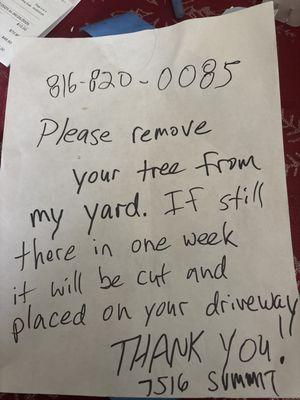 Owner left threats on my door and neighbor's door over a fallen tree issue. Since we rent our home, we have no control over the matter.