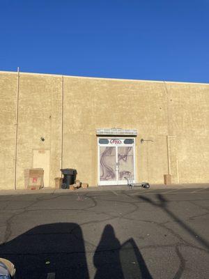 Outside the store. Can be kinda hard to find on gps, it's facing Dobson rd