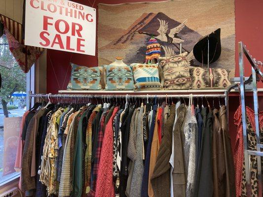 New and used clothing plus Peruvian hat & pillows.