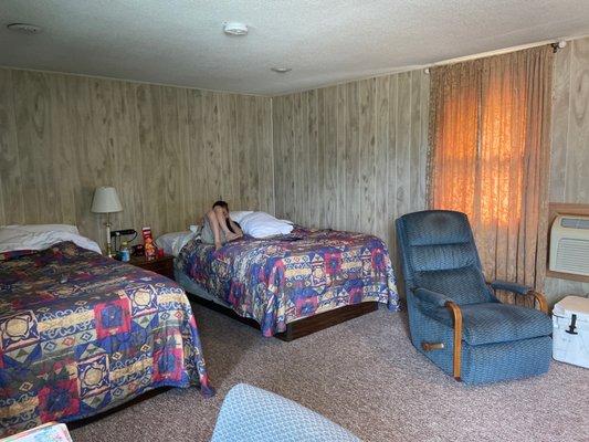 2 full size beds and a recliner.