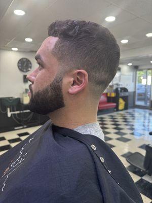 Haircut and beard combo.