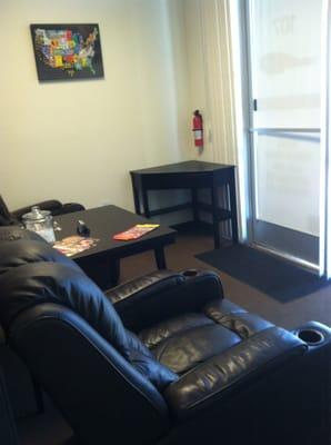 Relaxing on leather recliners in front waiting room
