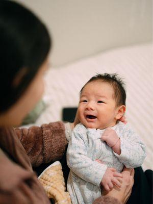 Ludgy holding our baby, who just started to smile :)