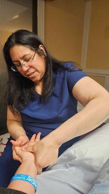 Providing hand reflexology