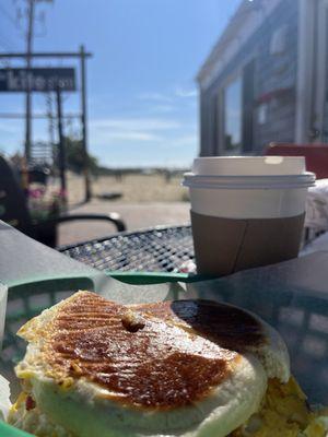 Beacon egg n cheese on a Portuguese muffin.