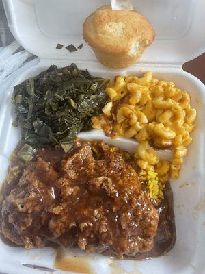 Cube steak, Collard Greens, Macaroni and Cheese, and Yellow Rice.