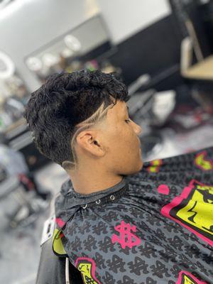 Taper with design in the side