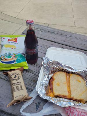 Pimento grilled cheese sandwich with VA ham, Cherries soda, Chips and an ice cream sandwich.