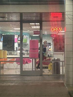 Rude worker and open sign still on