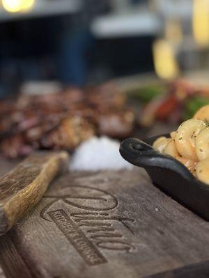 Butcher block that the steak is served on.